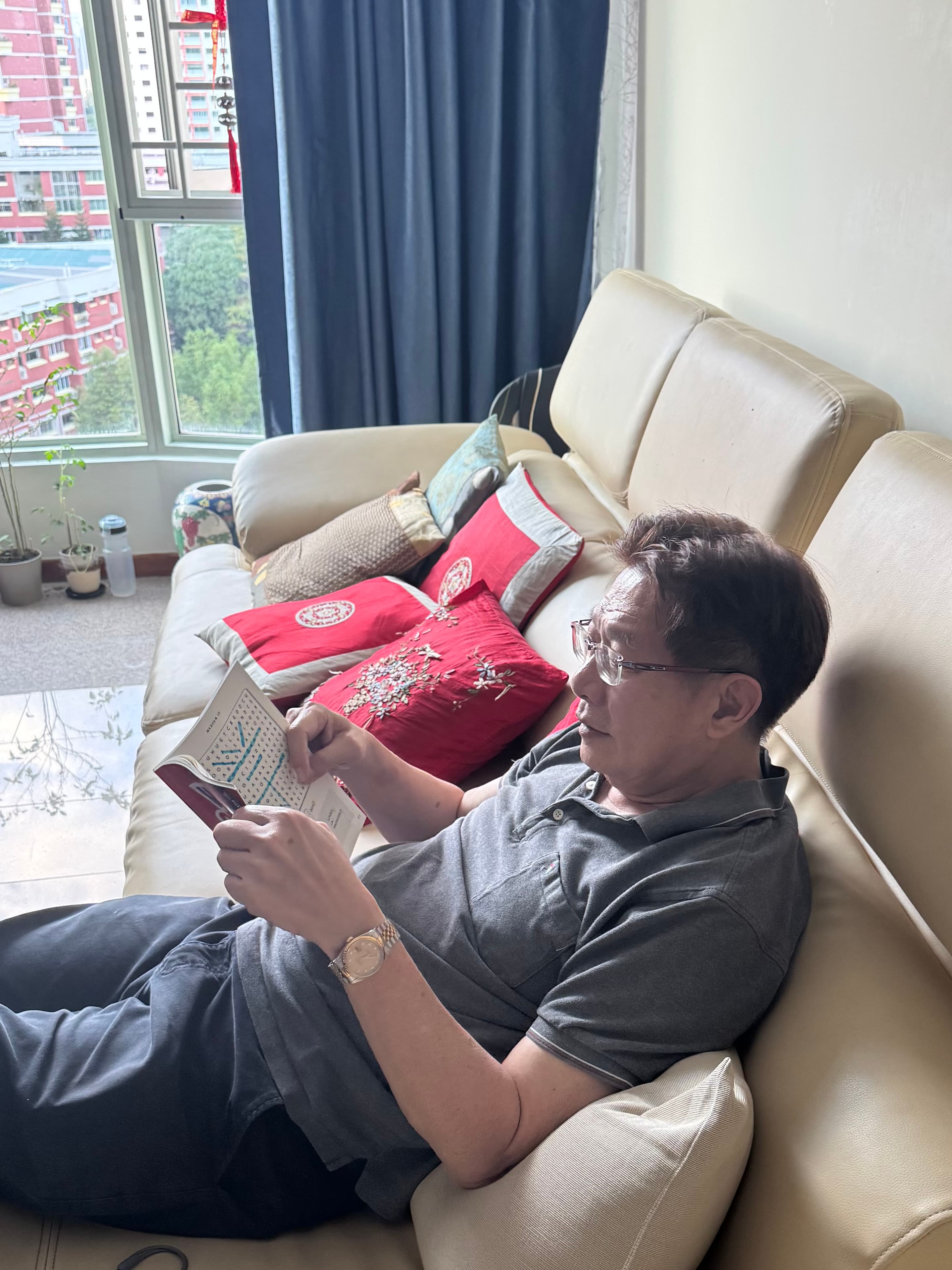 Photo from Joel: parent enjoying the word search book at home